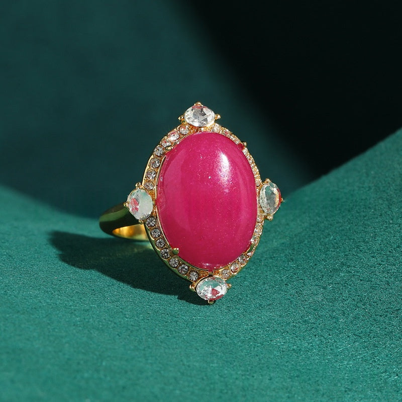 Vintage-Ring mit rotem Kristall und Achat