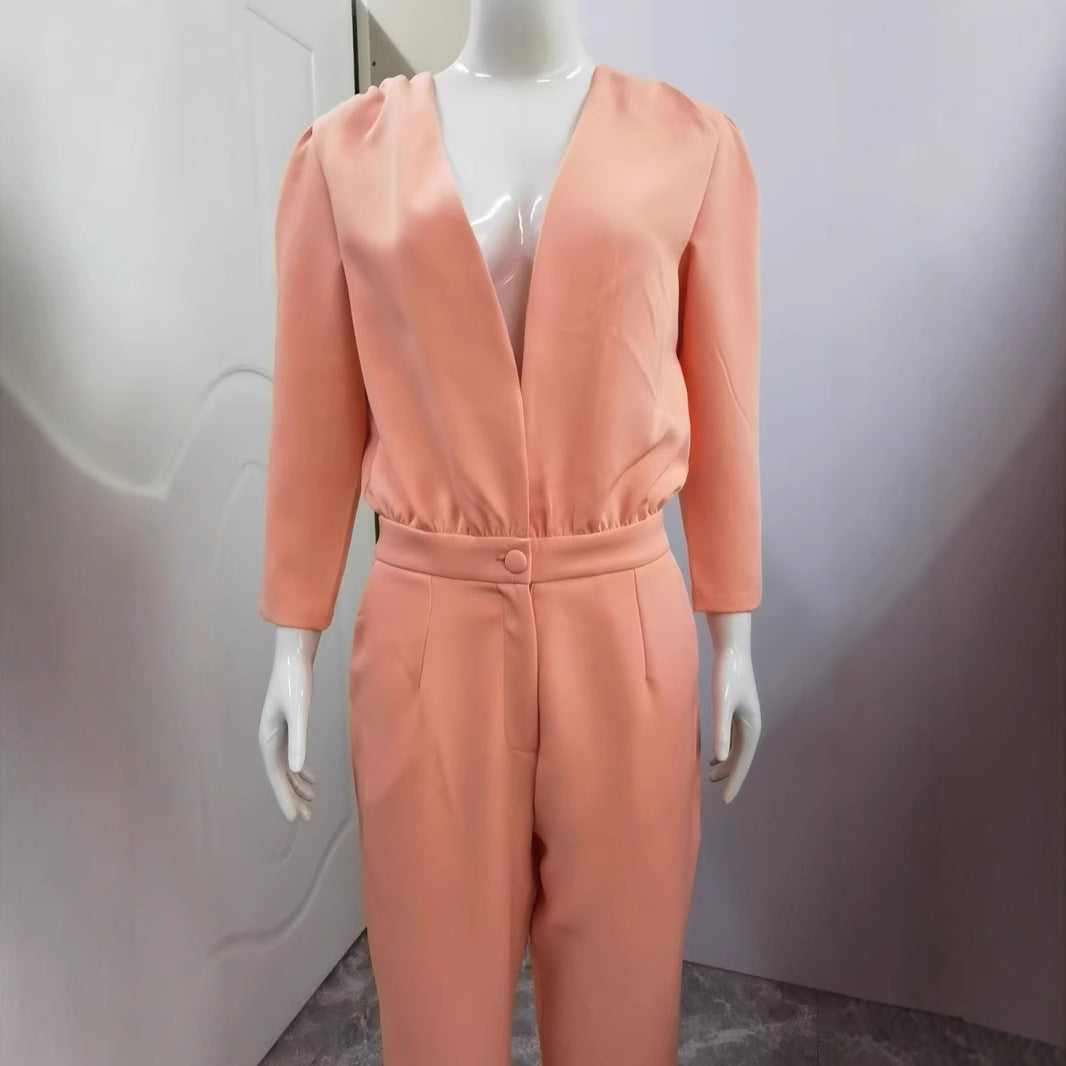 Oranger Jumpsuit mit V-Ausschnitt und Taillenkontrolle