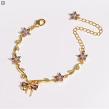 Modell: Schleife Lila Zirkon Gold