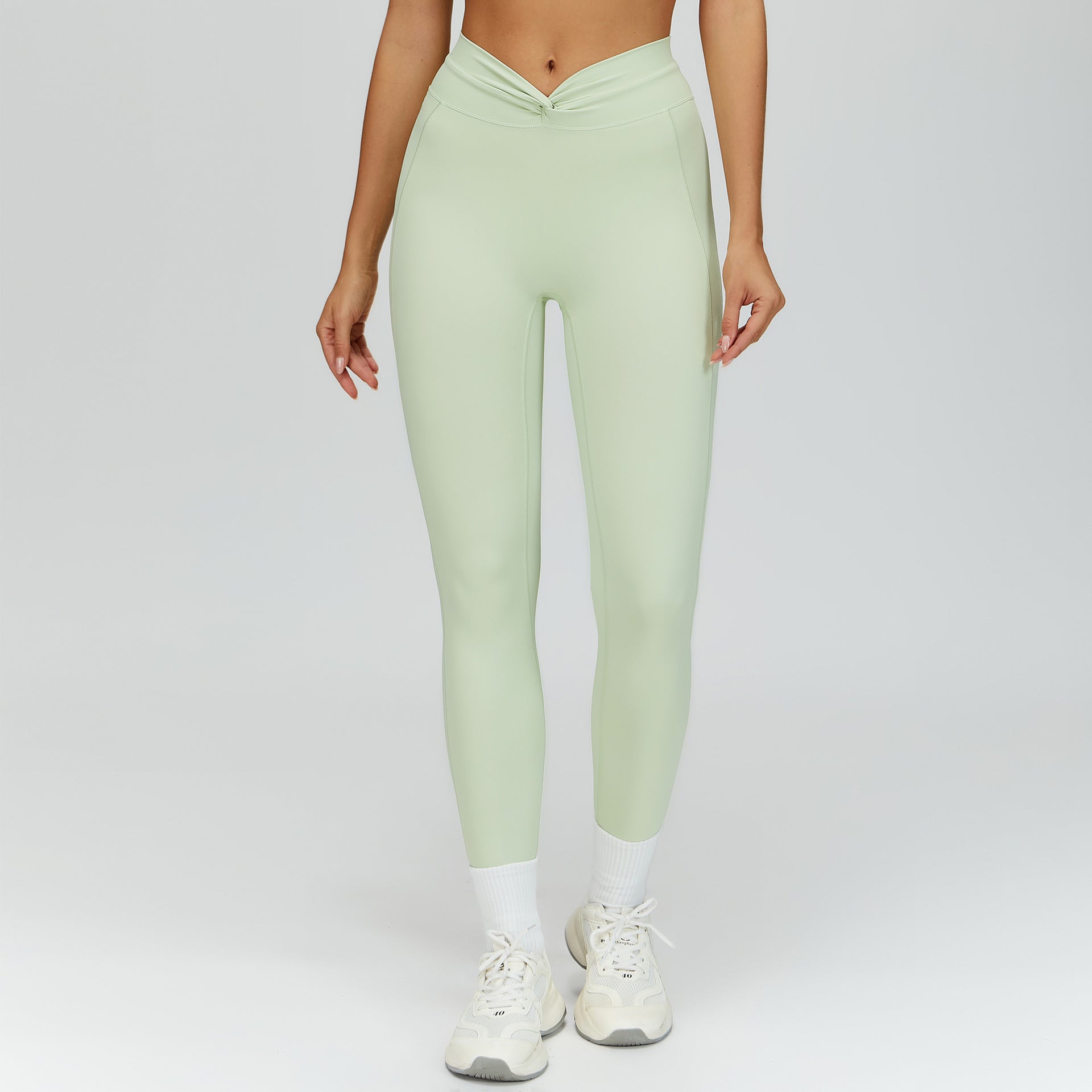High-Waist Fitnesshose mit gedrehten Falten