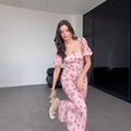 Elegantes Blumenkleid mit Quadrathals – Bild 1 | LuxeStyle
