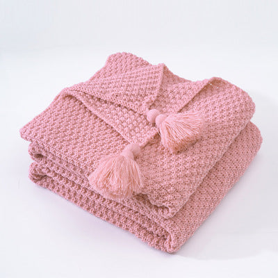Nordische Strickdecke mit Quasten