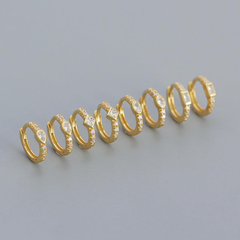 Diamantbesetzte Creolen