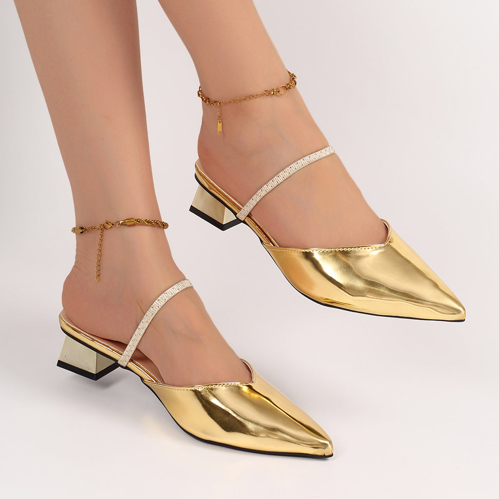 Elegante Metallic-Mules mit Strassriemen