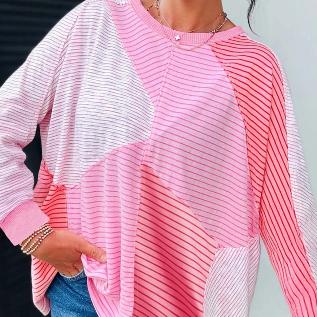 Rosa Pullover mit Streifen