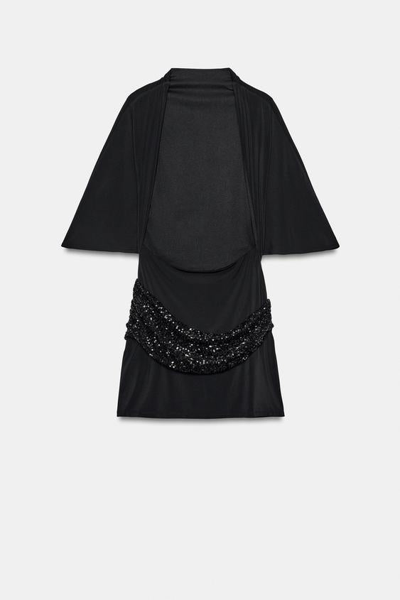 Pailletten- und Perlenkleid im Patchwork-Stil
