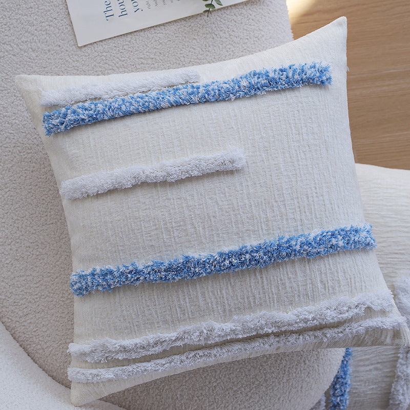 Blauer Kissenbezug mit Zierquaste
