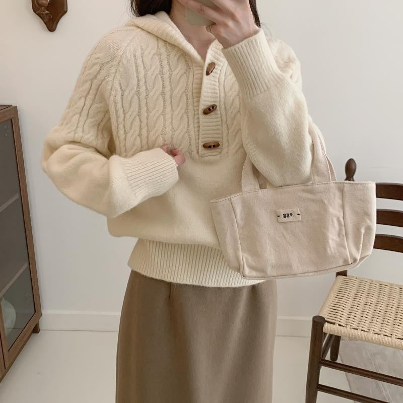 Kabelmuster-Pullover