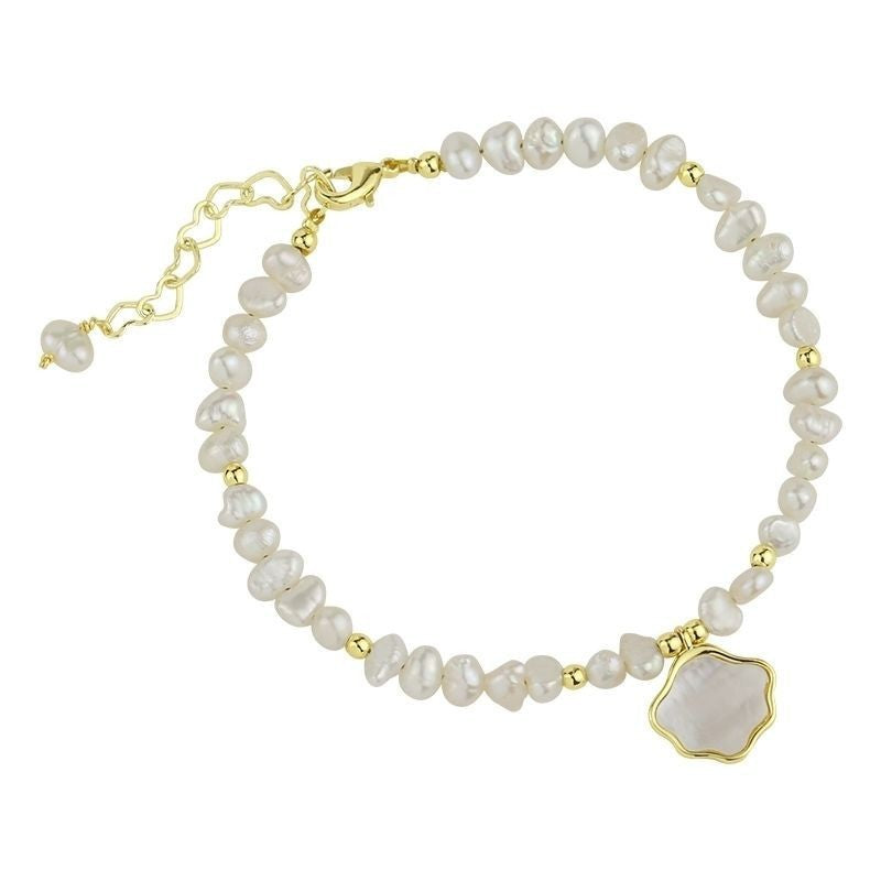 Perlenshalskette mit Muschelarmband