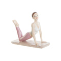 Rosa Yoga Figur: Scandi-Flair für entspannte Momente.