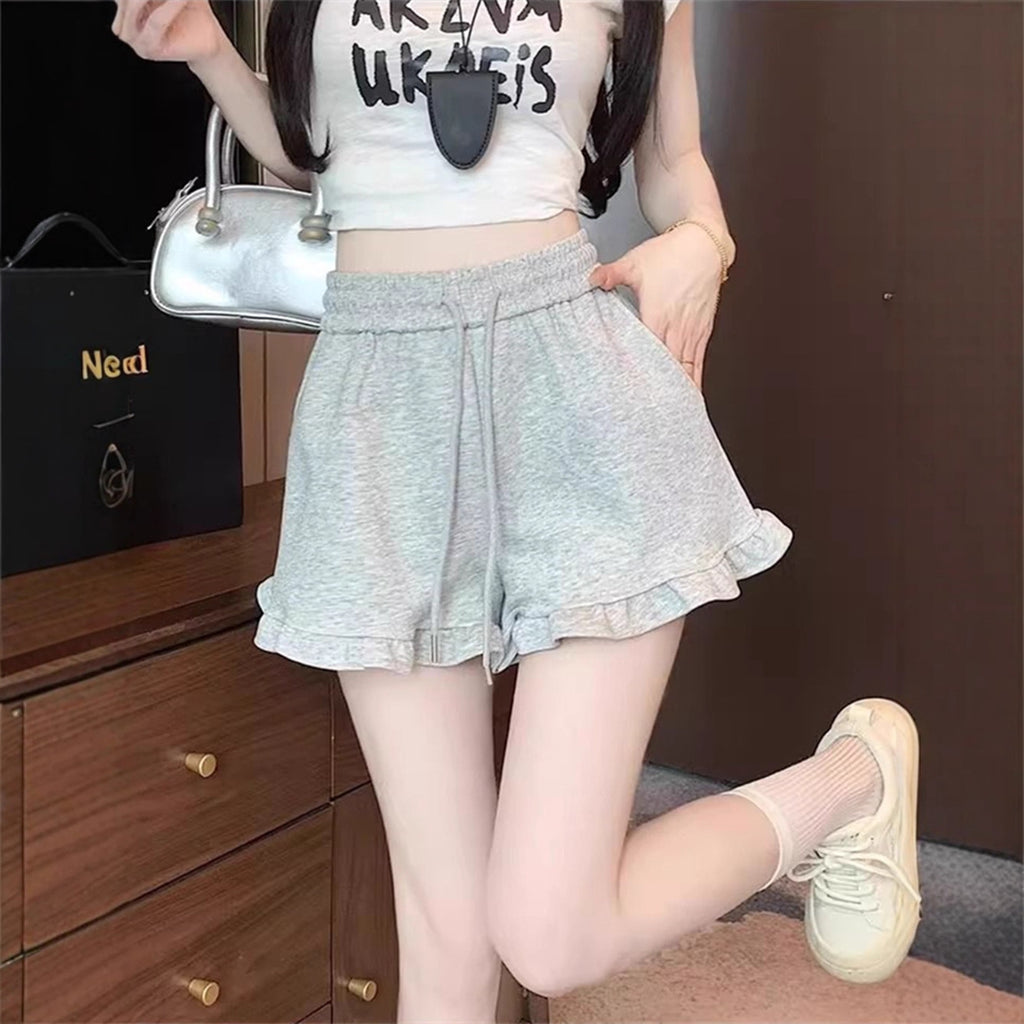 High Waist Shorts mit weitem Bein und Rüschen