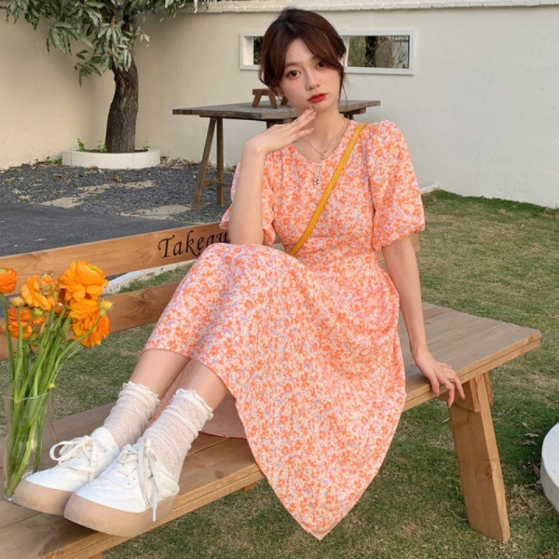 Oranges Midikleid mit Blumenprint und Puffärmeln | LuxeStyle