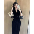 Schwarzes Fliessstoffkleid mit Flügelärmeln