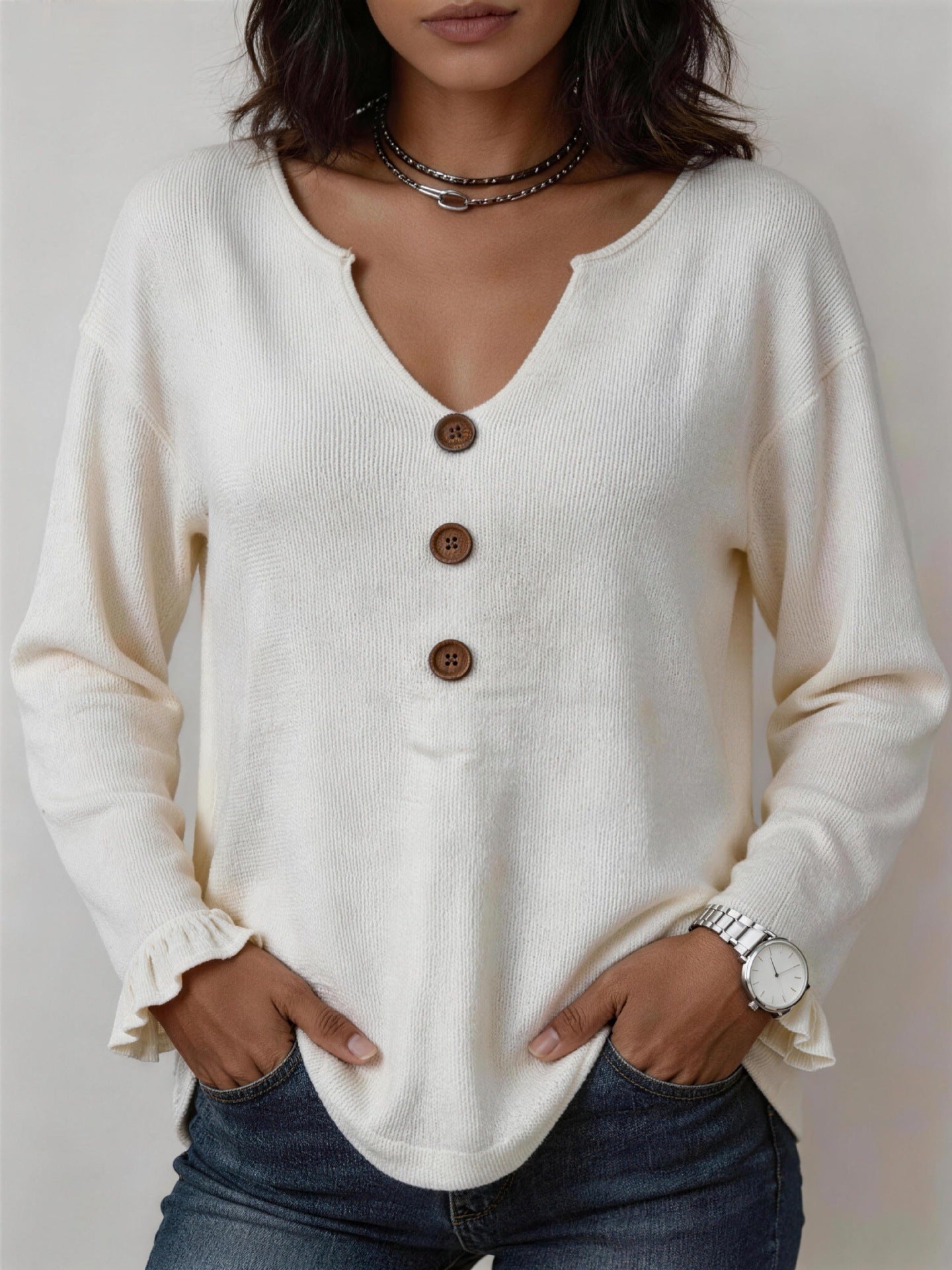 Strickpullover mit Rüschenärmeln und Knöpfen
