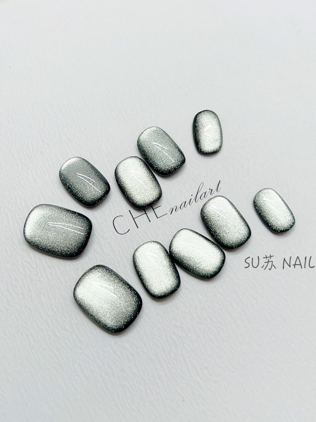 Dunkelgrüne Cat Eye Kunstnägel