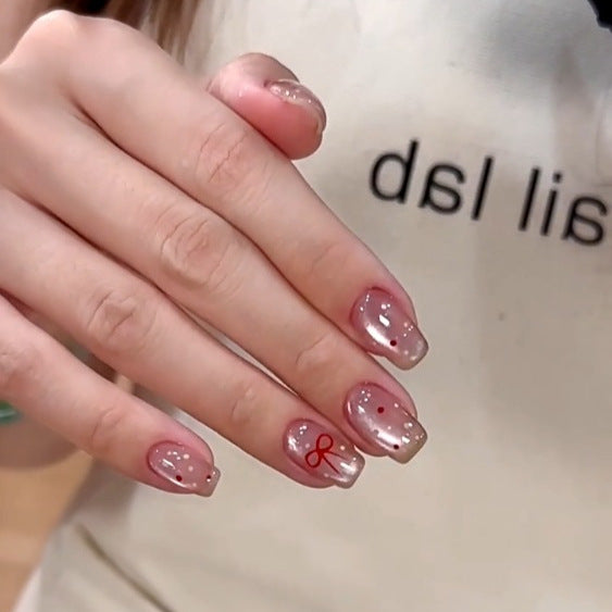 Cat-Eye Nagel-Tips mit Polka-Dot Sticker