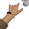 Armband aus Gold Obsidian und weissem Kristall – Bild 1 | LuxeStyle