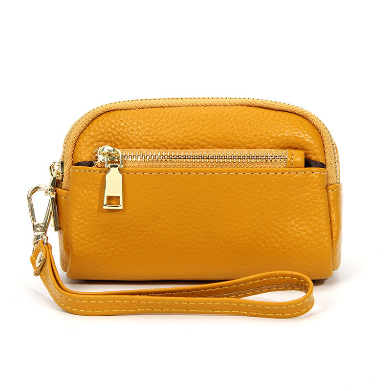 Minimalistische Leder-Münztasche mit drei Reissverschlüssen – Bild 2 | LuxeStyle