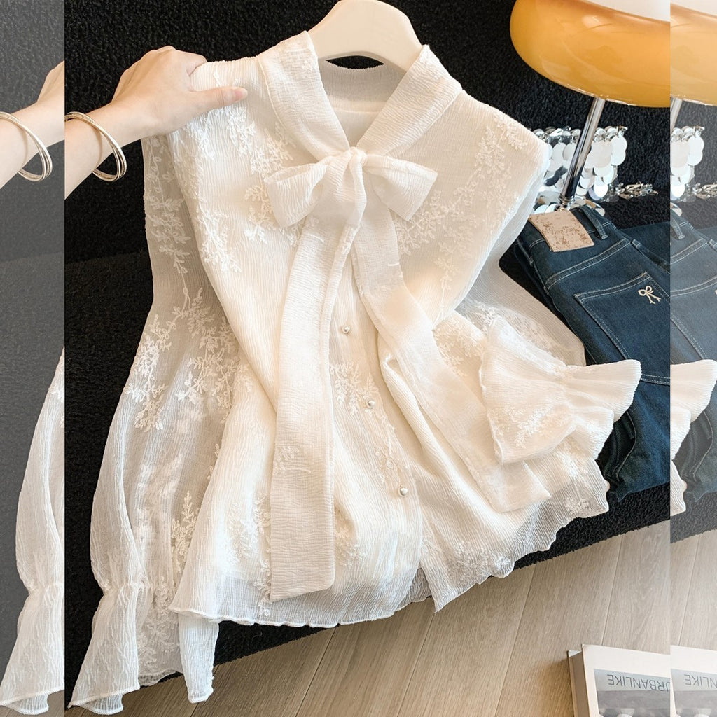 Elegante Jacquard-Bluse mit Schnürung