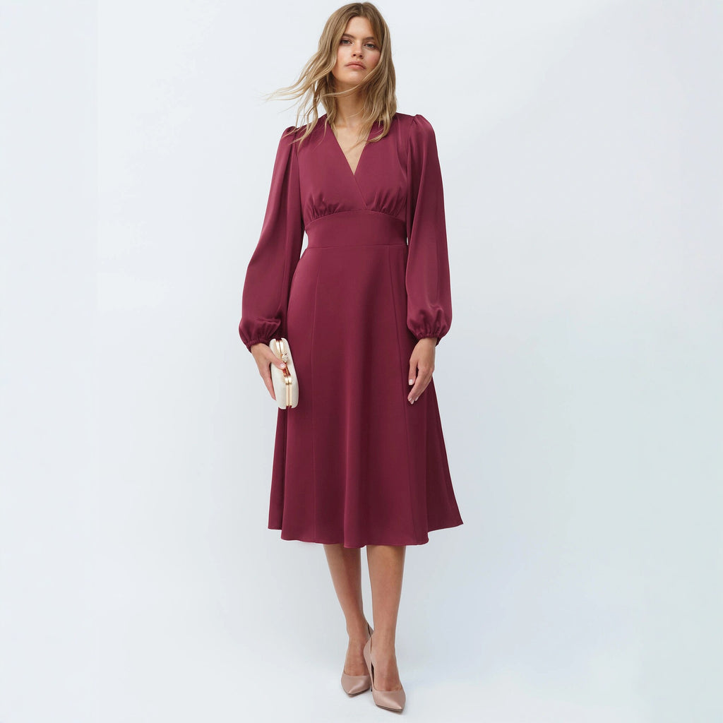Damen Kleid mit Puffärmeln und Taillierung