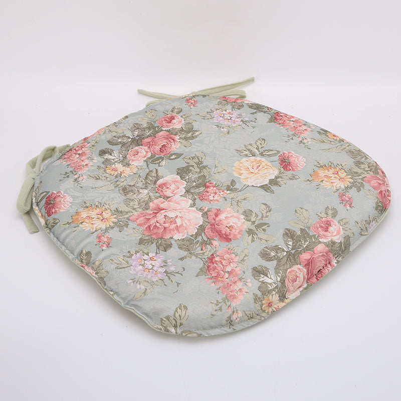 Kissen mit Blumenmuster und Bindegürtel