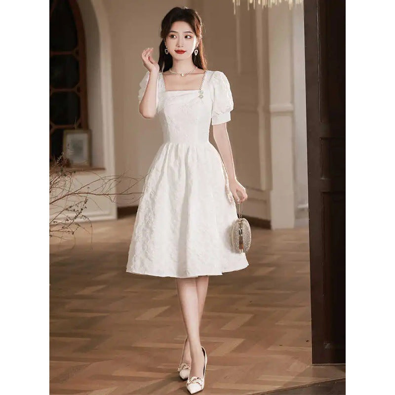 Kurzarm-Cocktailkleid mit Puffärmeln – Bild 2 | LuxeStyle