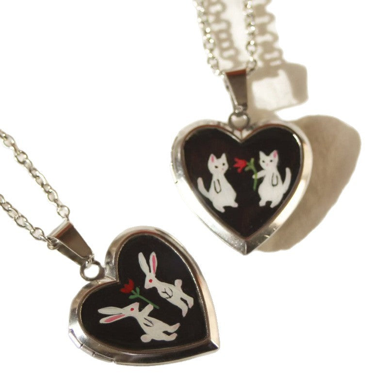 Herz-Hängeschmuck mit Fotoalbum