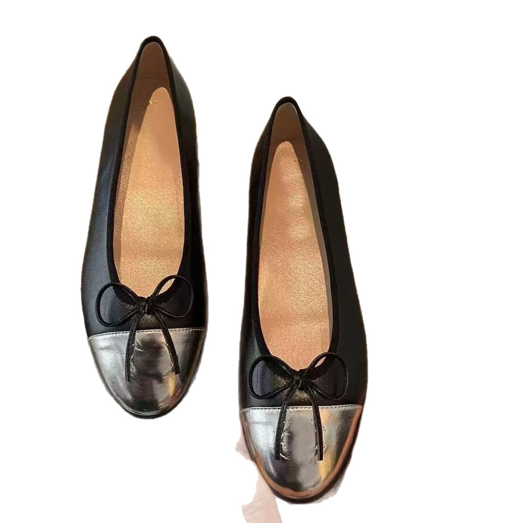 Flache Schuhe mit Schleife