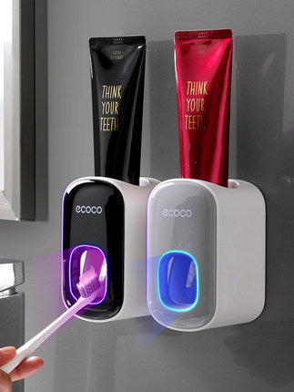 Wandmontierter Zahnpasta-Dispenser