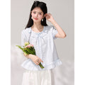 Elegante Bluse mit Puffärmeln und Rundhals