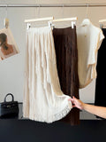 Asymmetrischer Jupe mit Quasten