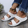 Sandalen mit Stickerei und Keilabsatz – Bild 9 | LuxeStyle