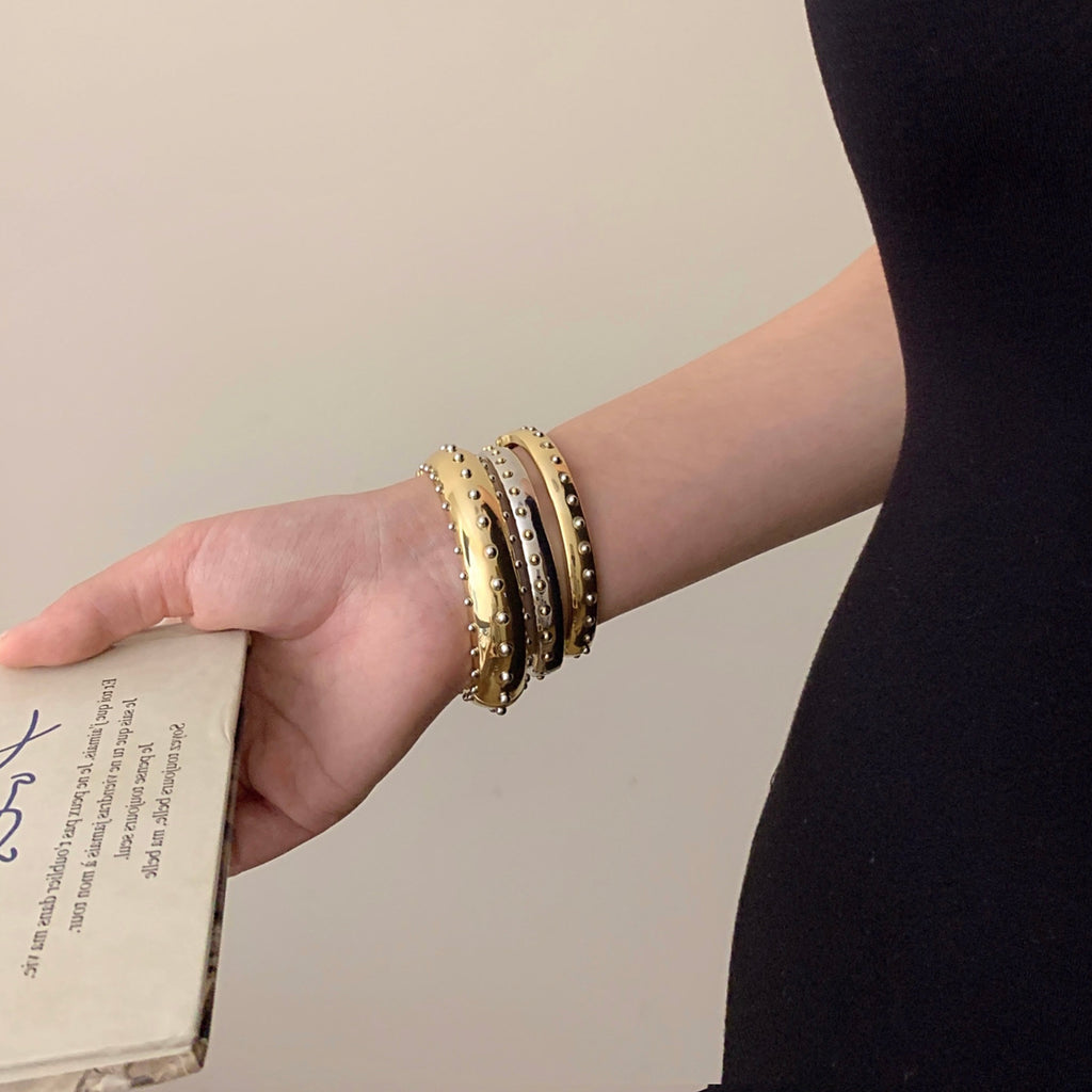 Vintage Dreifach-Armreif mit Nieten