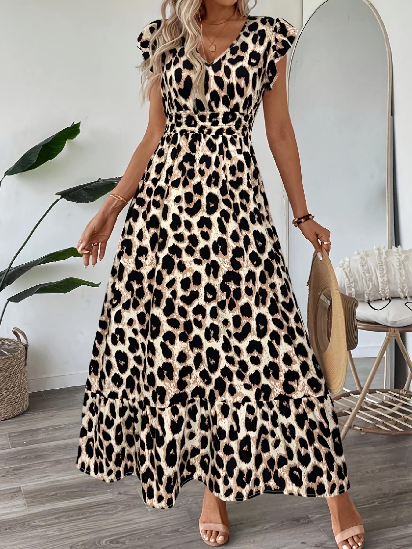 Türkises Kleid mit Zitronenmuster