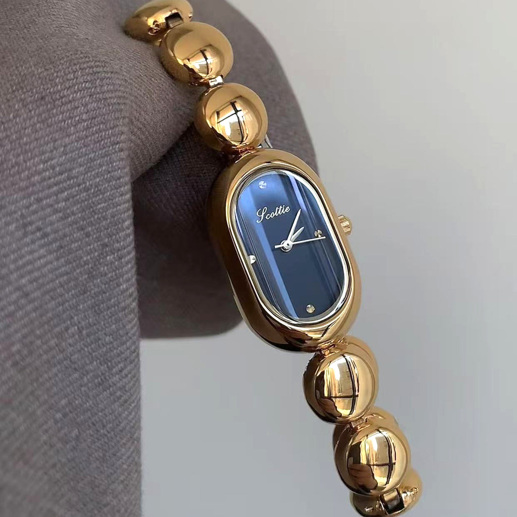 Oval-Uhr mit Quarzwerk und dekorativem Gehäuse – Bild 2 | LuxeStyle
