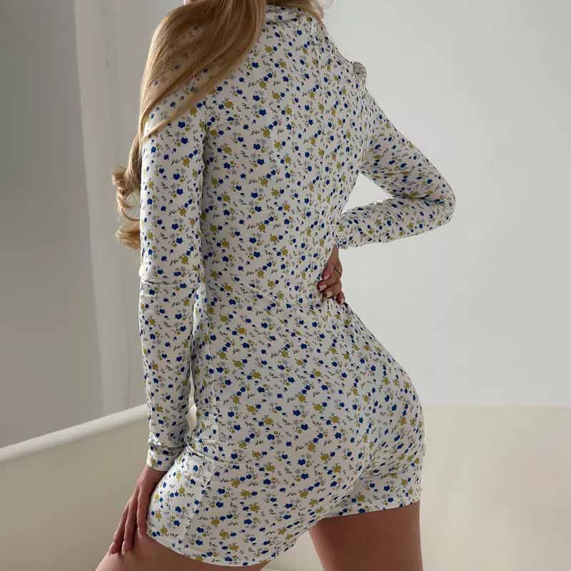 Gemusterter Langarm-Jumpsuit mit hoher Taille