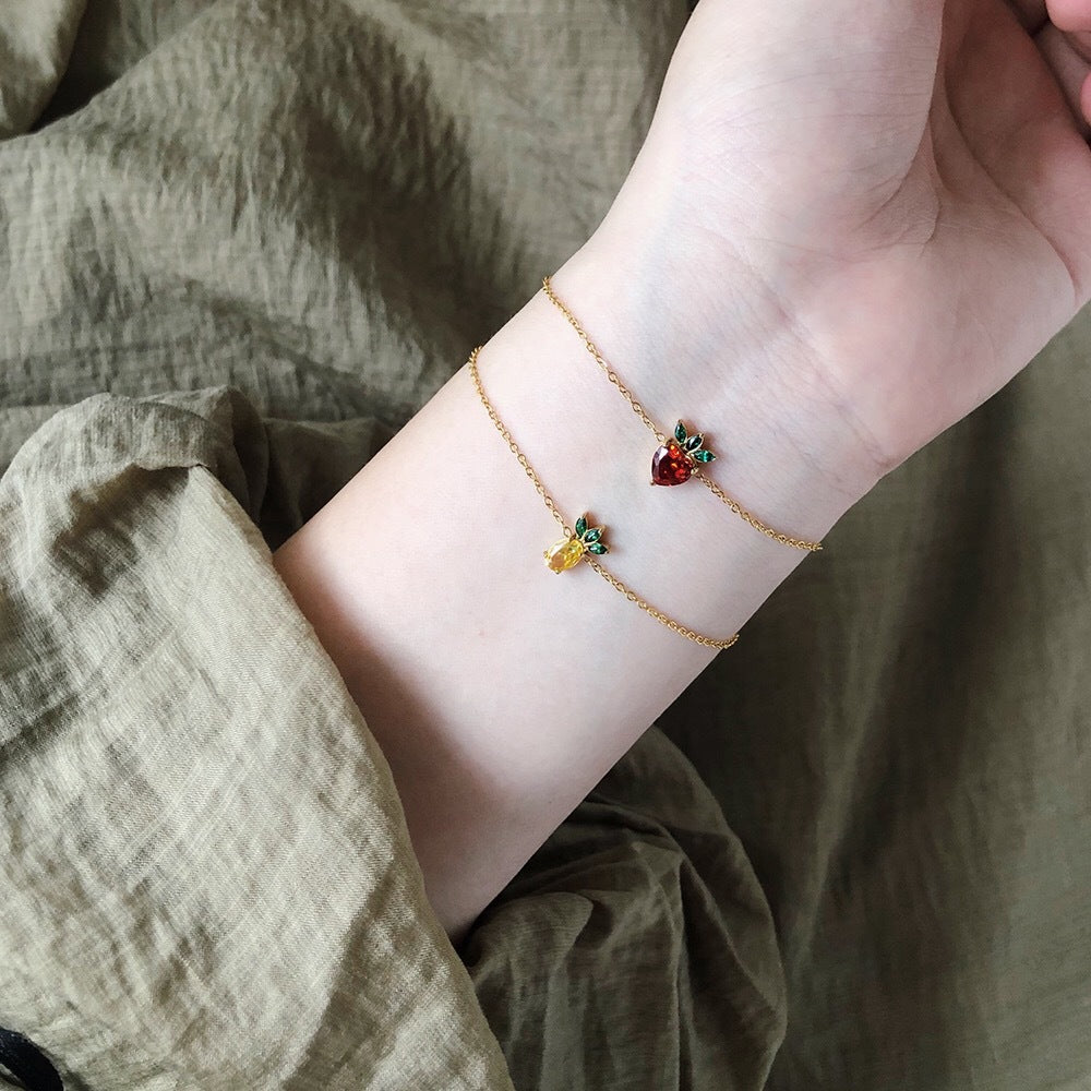 Armband mit Ananas- und Erdbeer-Motiv – Bild 5 | LuxeStyle