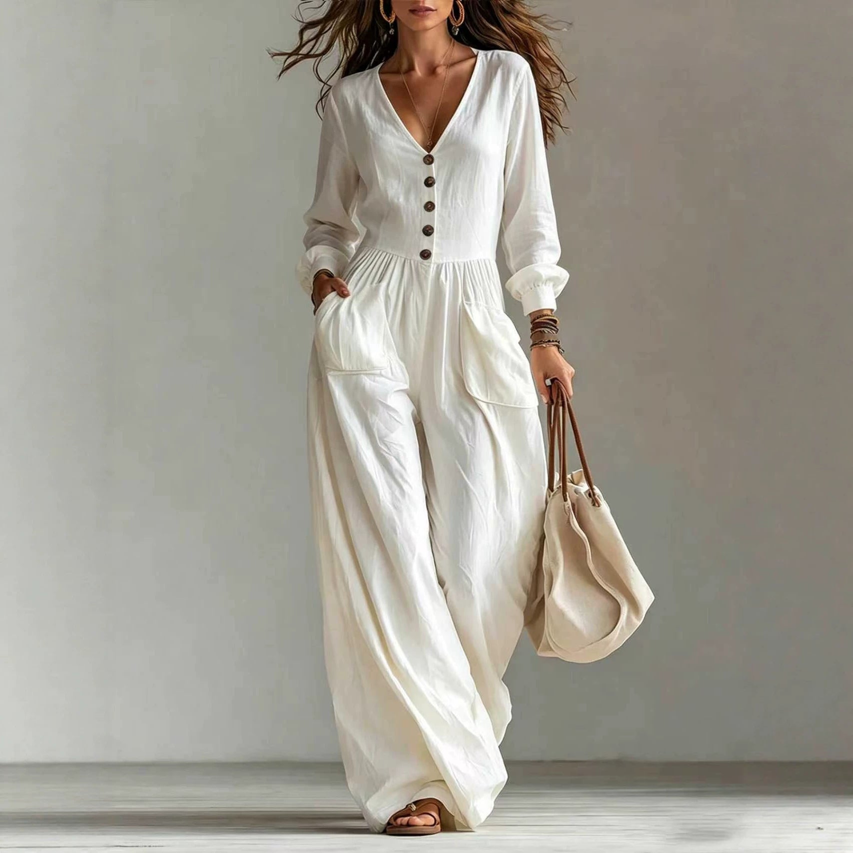 Eleganter Langarm-Jumpsuit mit weitem Bein und V-Ausschnitt