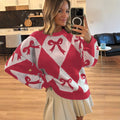 Pullover mit Schleifenmuster und Kontrastdetails