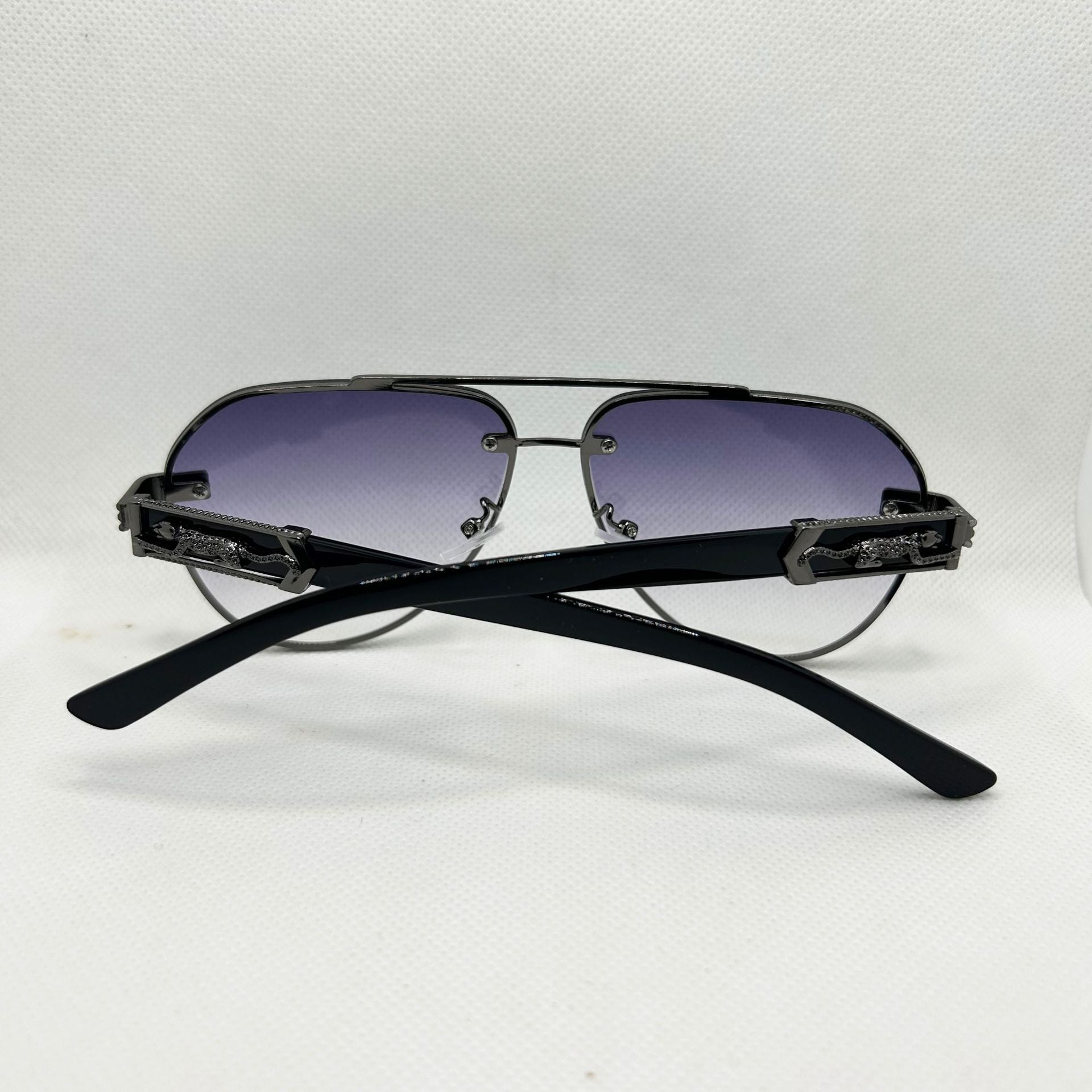 Randlose Sonnenbrille mit Leopardenkopf