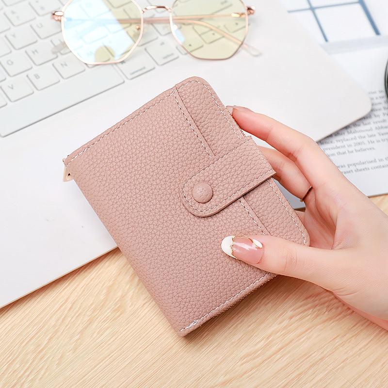 Kurzes Damen-Portemonnaie mit Litschi-Muster – Bild 3 | LuxeStyle