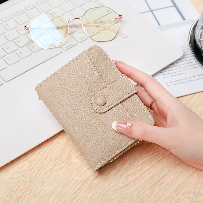 Kurzes Damen-Portemonnaie mit Litschi-Muster – Bild 4 | LuxeStyle