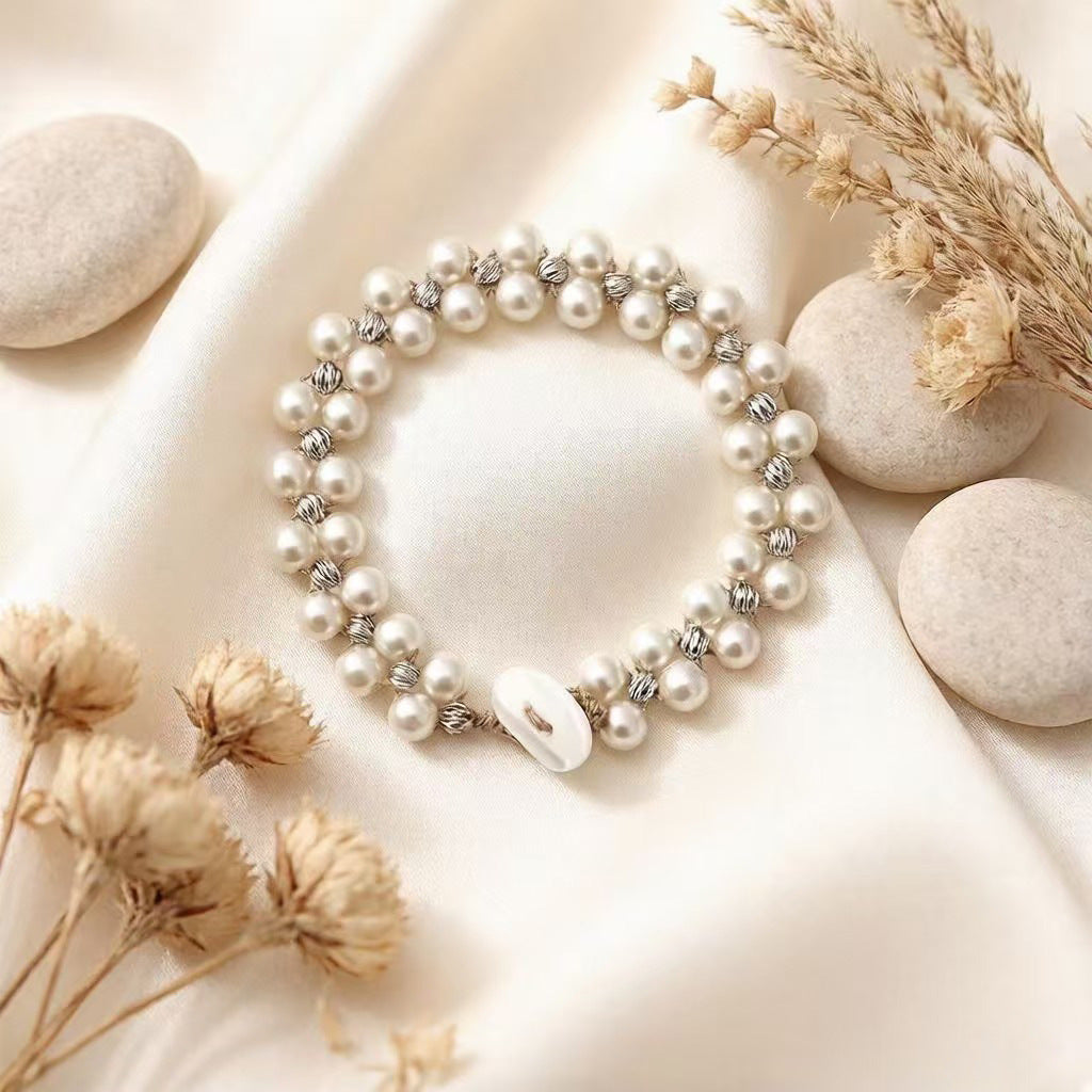 Armband mit grossen und kleinen Imitationsperlen