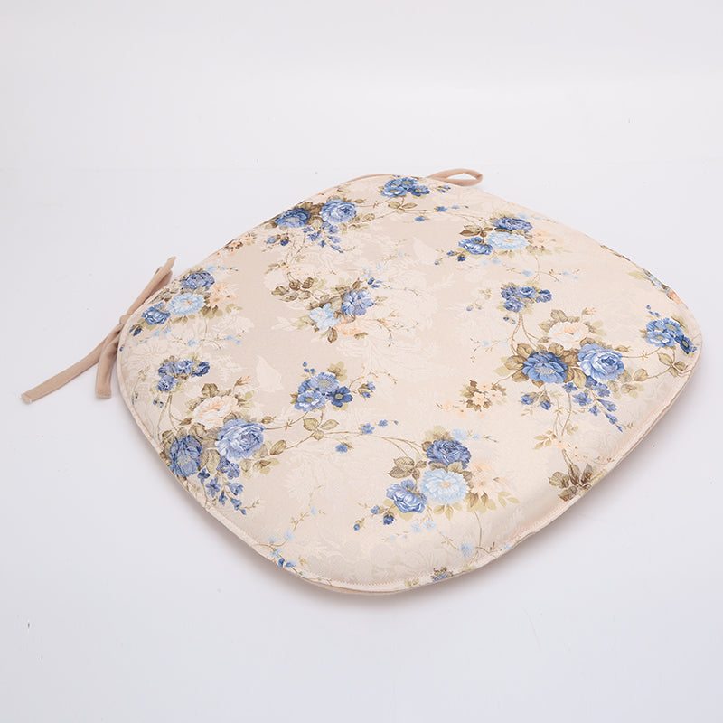 Kissen mit Blumenmuster und Bindegürtel