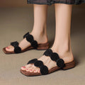 Flache Zehensteg-Sandalen aus Schafsleder