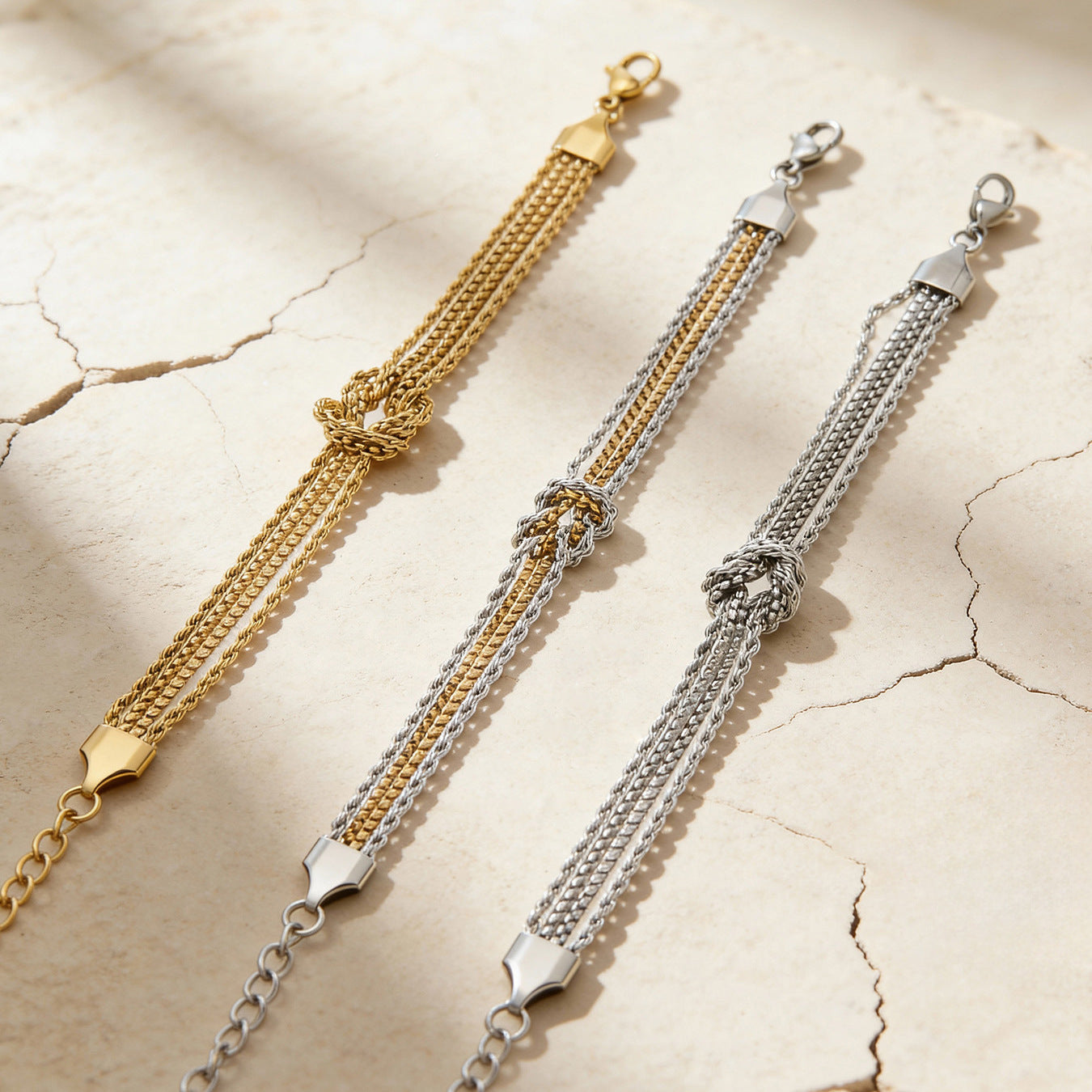 Verknotetes Ketten-Armband · Gold/Silber
