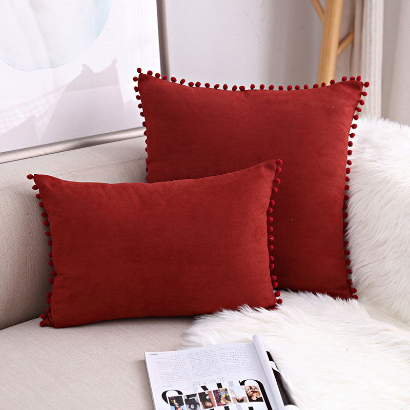Sofa Kissen mit verspielten Bommeln – Bild 18 | LuxeStyle