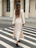 Elegantes Abendkleid mit Puffärmeln und Schlitz