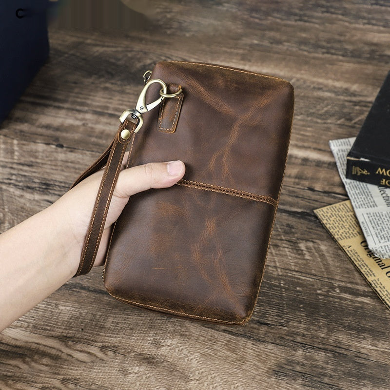 Braune Lederhandtasche für grosse Smartphones