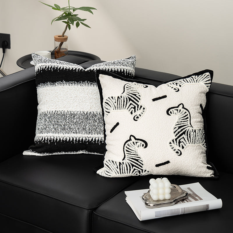 Dekokissen mit Tiermuster oder geometrischem Design
